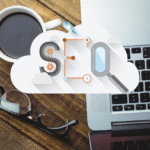 SEO cloud graphic with an SEO icon displayed on a laptop screen, symbolizing digital marketing strategies.