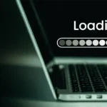 Laptop screen showing a loading progress bar.